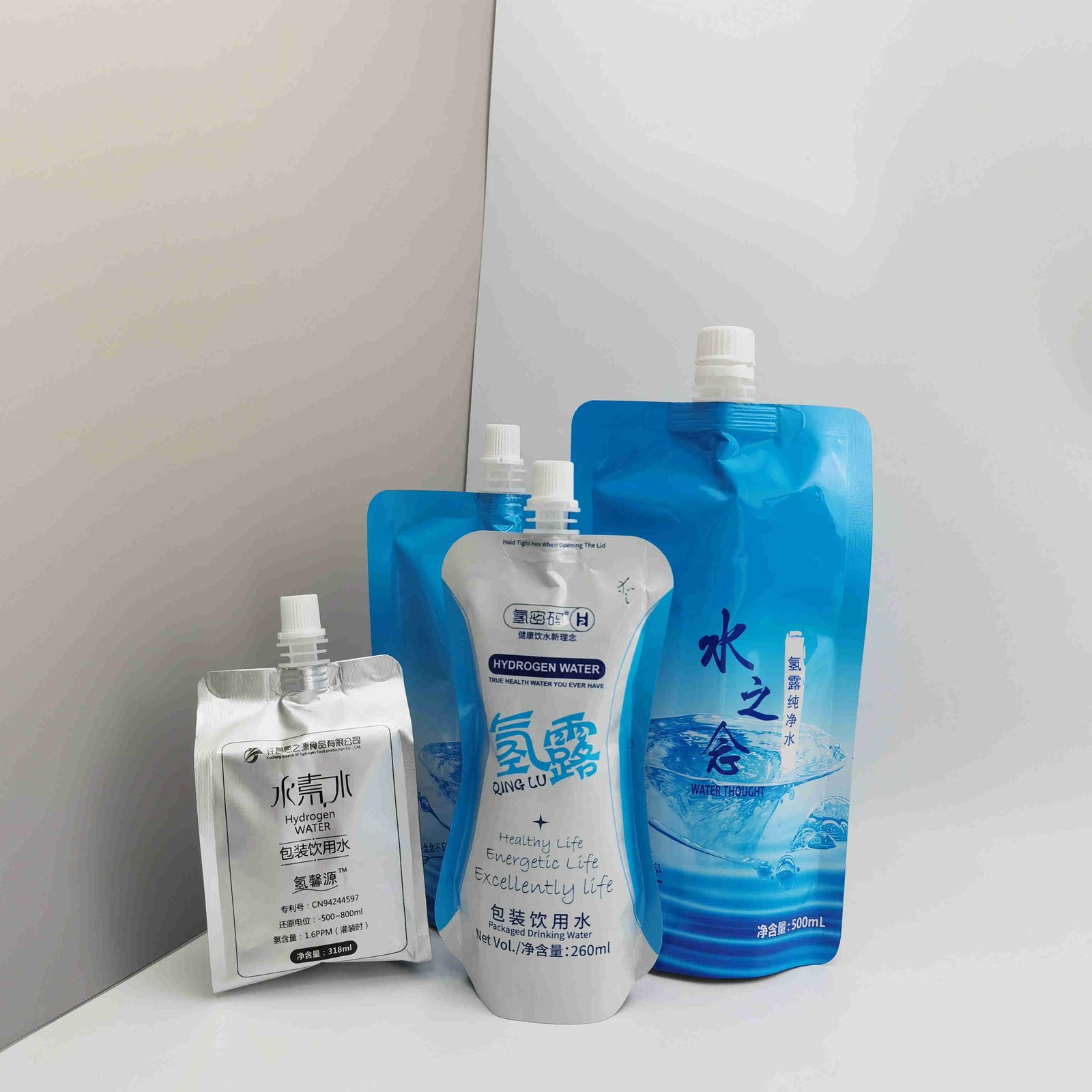 四边封富氢水袋350ml饮用水吸嘴铝箔袋加尼龙四层复合铝塑吸嘴袋
